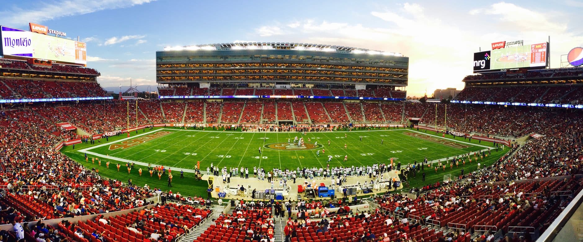 A stunning panoramic shot of Levi's Stadium in Santa Clara during a packed football game a