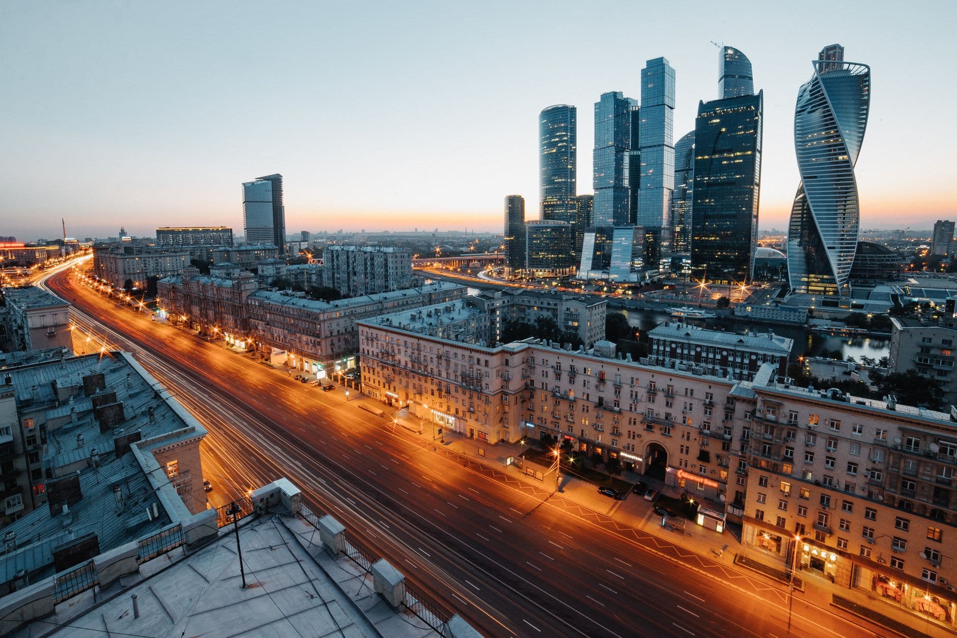 Aerial view of Moscow's skyscrapers and urban skyline during twilight, showcasing modern a