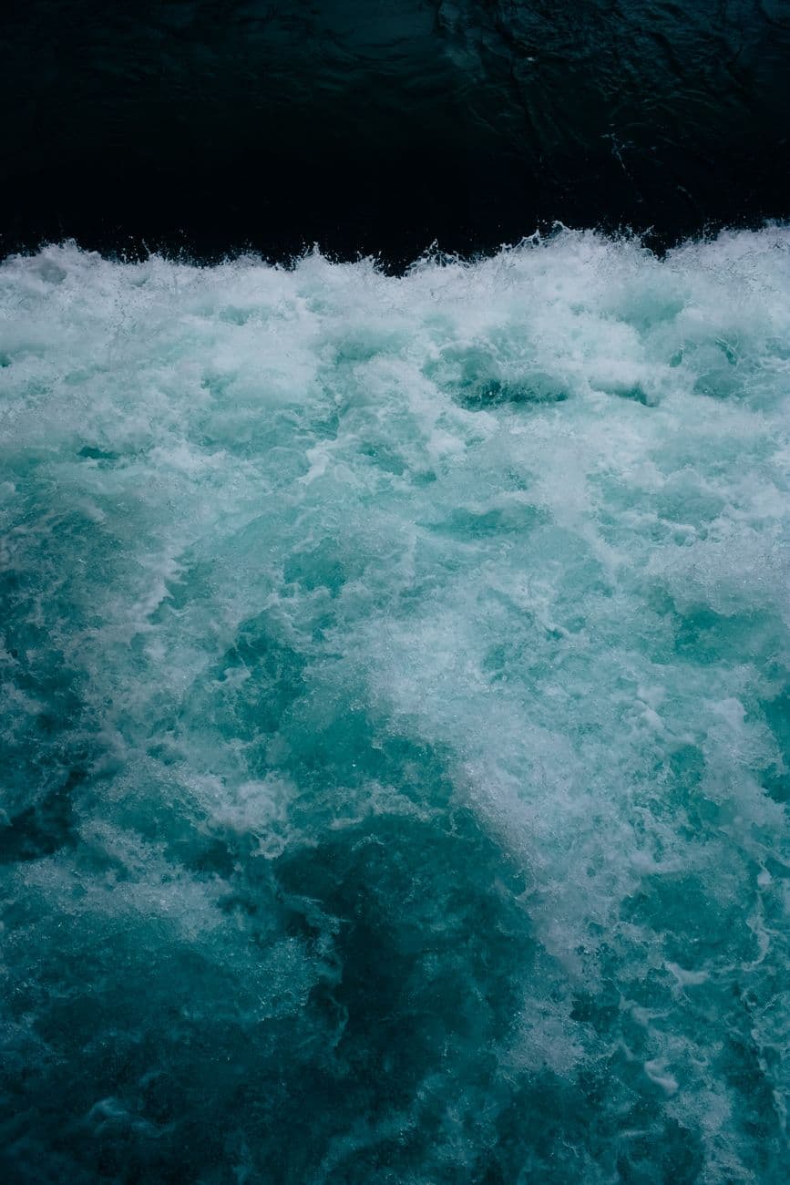 Captivating image of ocean surf with dynamic motion, highlighted by vibrant turquoise hues