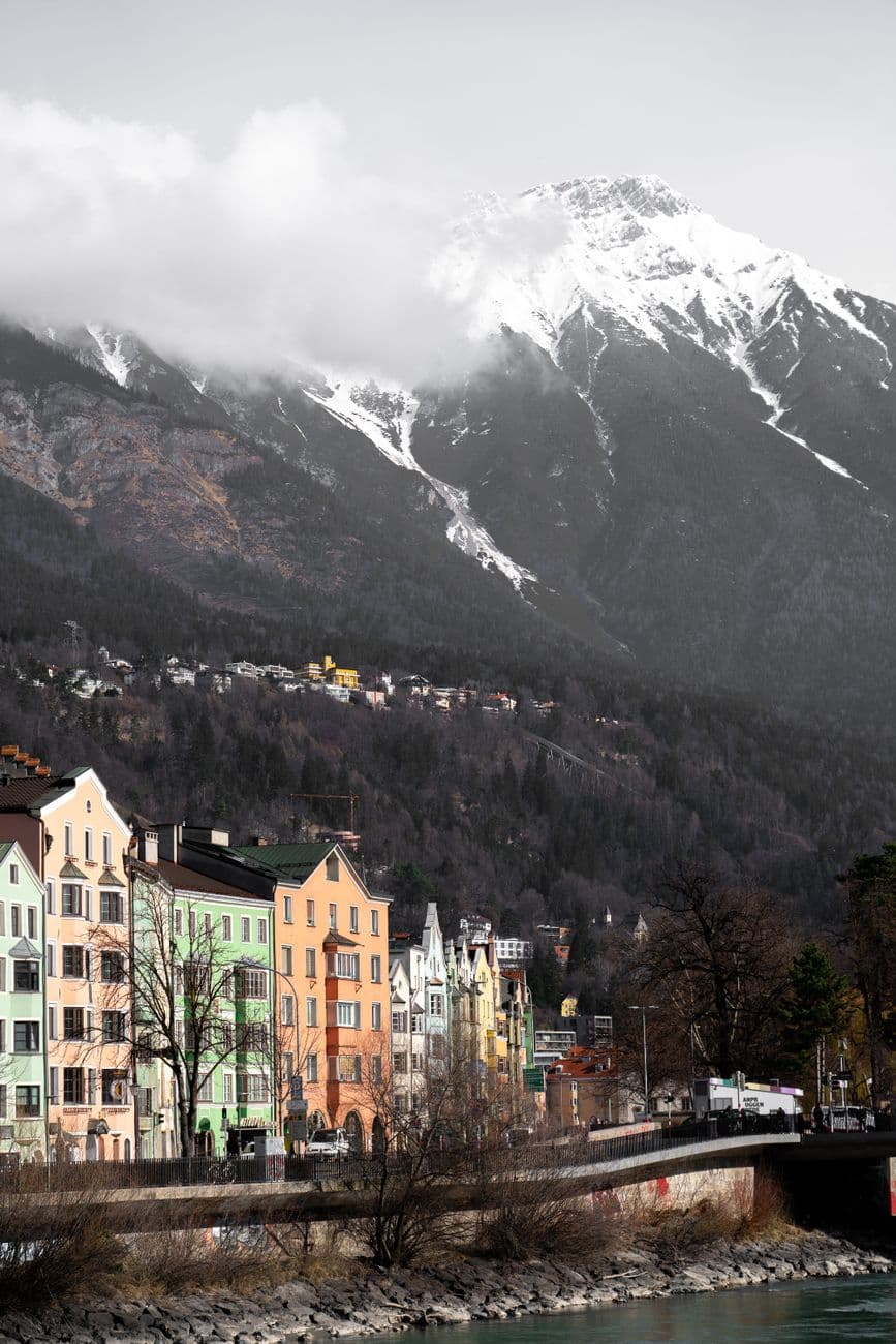 Innsbruck's colorful houses with the majestic snow-capped Alps in the background create a