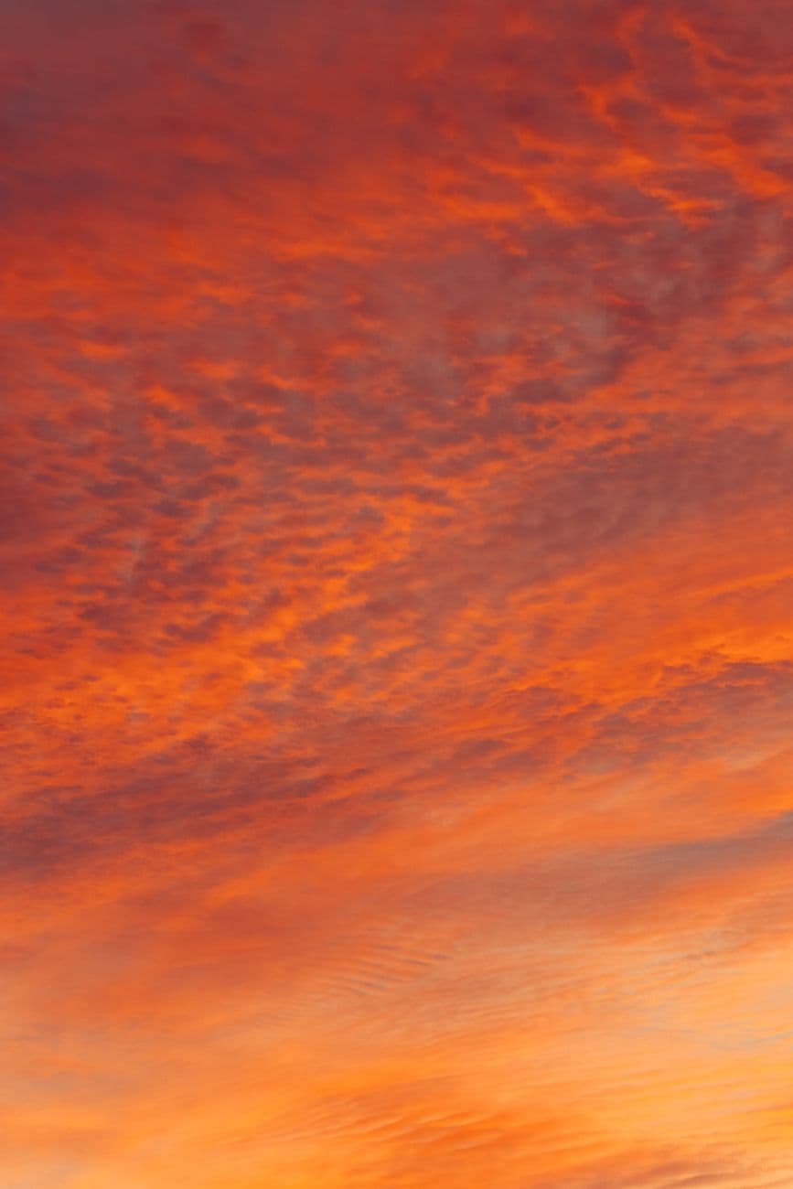 Stunning orange sunset sky in Akumal, Quintana Roo, Mexico. Perfect for nature lovers and
